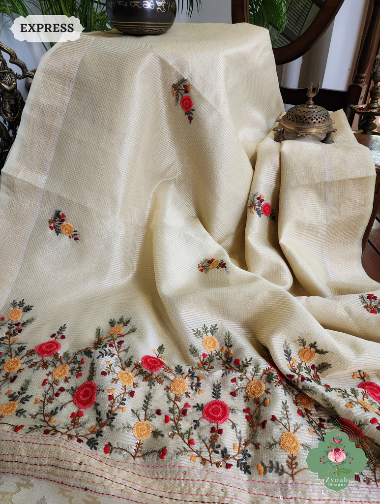 Zynah Off White Kota Tissue Saree With Golden Check, Jamdani Weaving Organza Pallu & Frenchknot Hand Embroidery; Custom Stitched/Ready-made Blouse, Fall, Petticoat; SKU: 1209202401