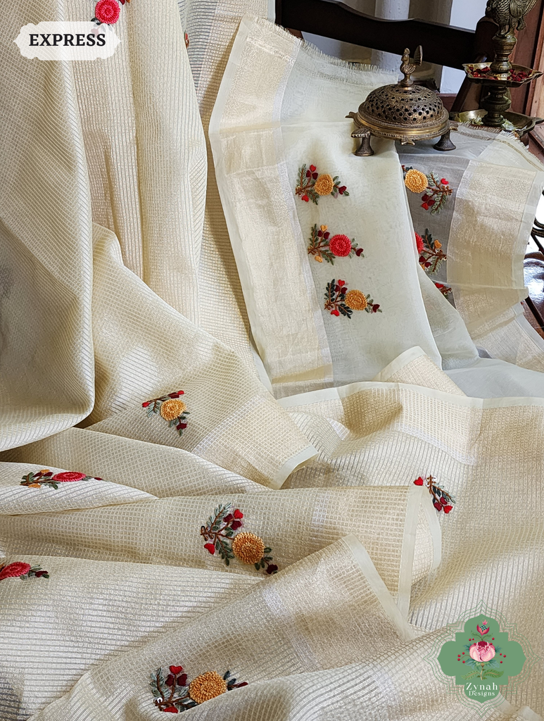 Zynah Off White Kota Tissue Saree With Golden Check, Jamdani Weaving Organza Pallu & Frenchknot Hand Embroidery; Custom Stitched/Ready-made Blouse, Fall, Petticoat; SKU: 1209202401