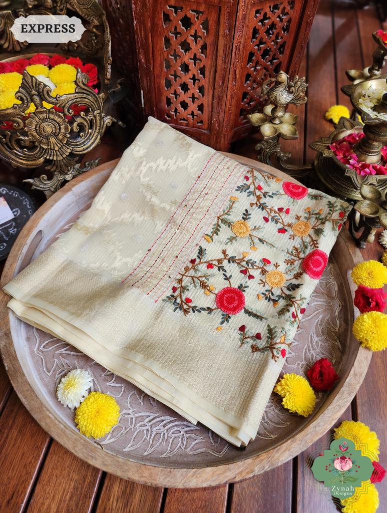 Zynah Off White Kota Tissue Saree With Golden Check, Jamdani Weaving Organza Pallu & Frenchknot Hand Embroidery; Custom Stitched/Ready-made Blouse, Fall, Petticoat; SKU: 1209202401