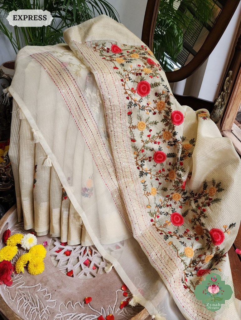 Zynah Off White Kota Tissue Saree With Golden Check, Jamdani Weaving Organza Pallu & Frenchknot Hand Embroidery; Custom Stitched/Ready-made Blouse, Fall, Petticoat; SKU: 1209202401