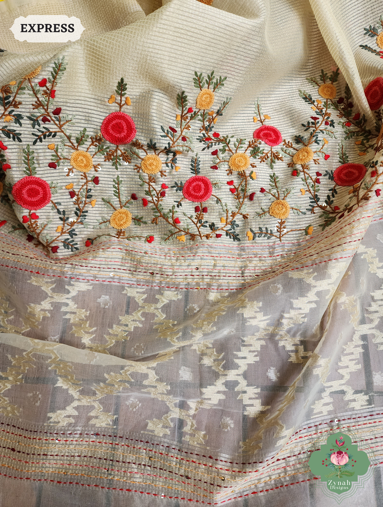 Zynah Off White Kota Tissue Saree With Golden Check, Jamdani Weaving Organza Pallu & Frenchknot Hand Embroidery; Custom Stitched/Ready-made Blouse, Fall, Petticoat; SKU: 1209202401
