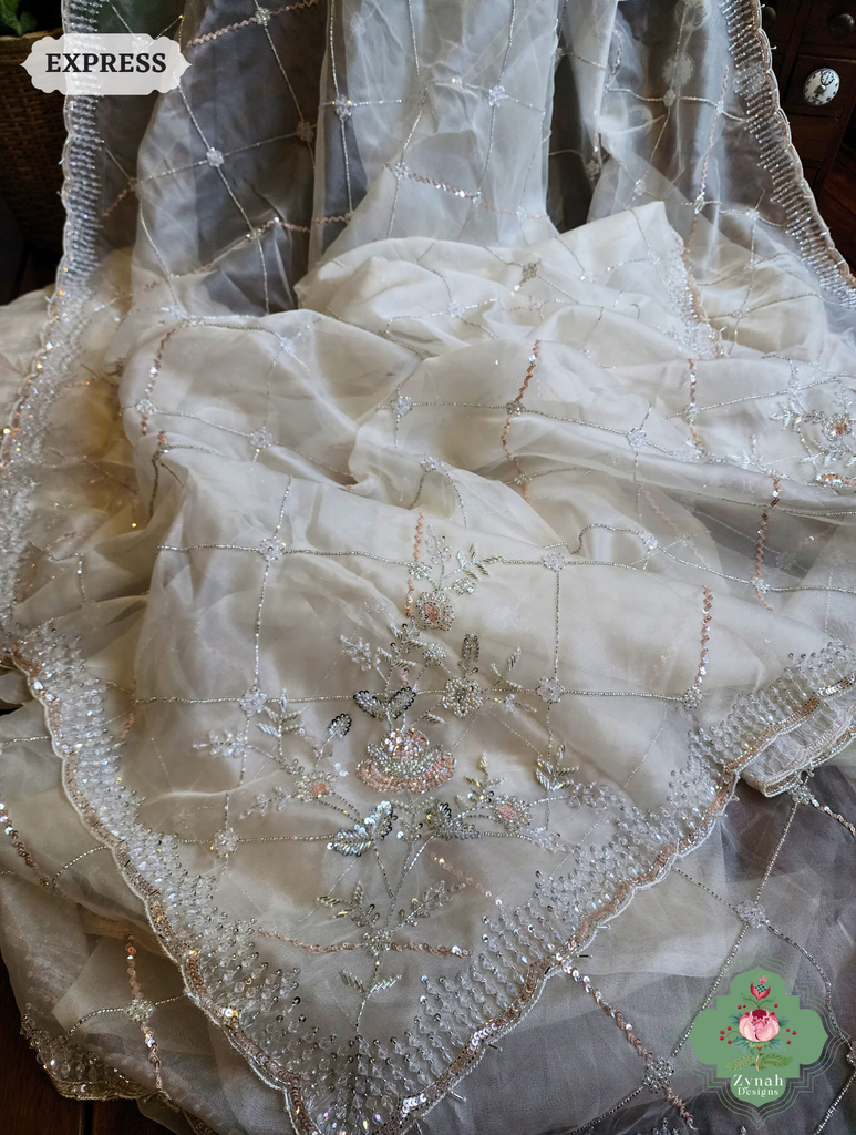 Zynah Off White Organza Silk Saree With Pearls, Cutdana, Sequins & Crystals Hand Embellishments; Custom Stitched/Ready-made Blouse, Fall, Petticoat; SKU: 2711202403