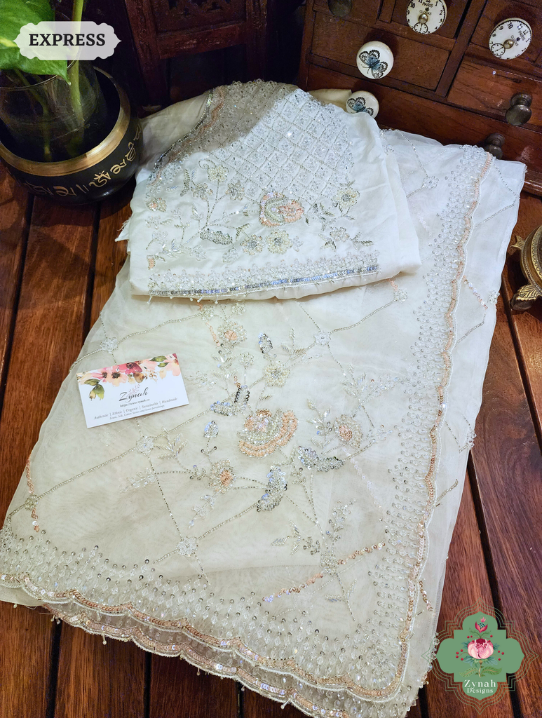 Zynah Off White Organza Silk Saree With Pearls, Cutdana, Sequins & Crystals Hand Embellishments; Custom Stitched/Ready-made Blouse, Fall, Petticoat; SKU: 2711202403