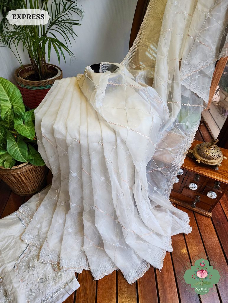 Zynah Off White Organza Silk Saree With Pearls, Cutdana, Sequins & Crystals Hand Embellishments; Custom Stitched/Ready-made Blouse, Fall, Petticoat; SKU: 2711202403