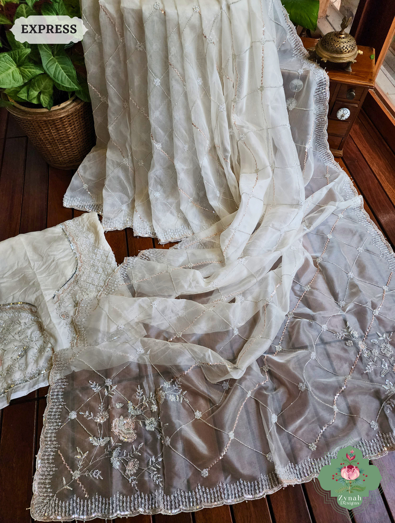 Zynah Off White Organza Silk Saree With Pearls, Cutdana, Sequins & Crystals Hand Embellishments; Custom Stitched/Ready-made Blouse, Fall, Petticoat; SKU: 2711202403