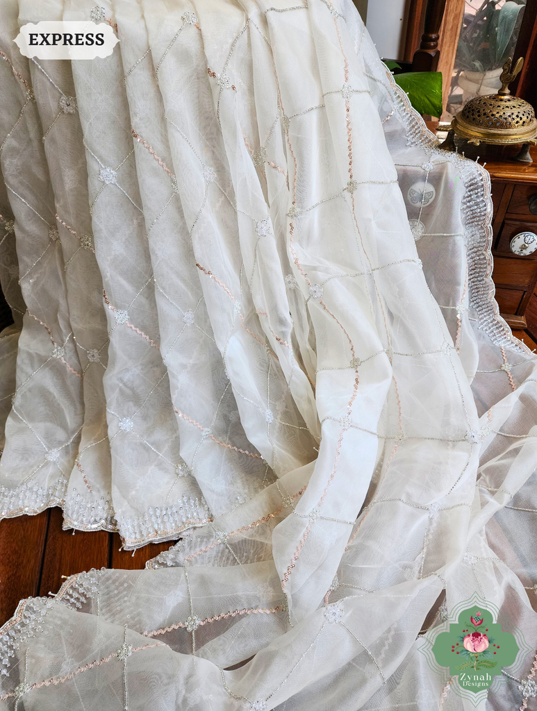 Zynah Off White Organza Silk Saree With Pearls, Cutdana, Sequins & Crystals Hand Embellishments; Custom Stitched/Ready-made Blouse, Fall, Petticoat; SKU: 2711202403