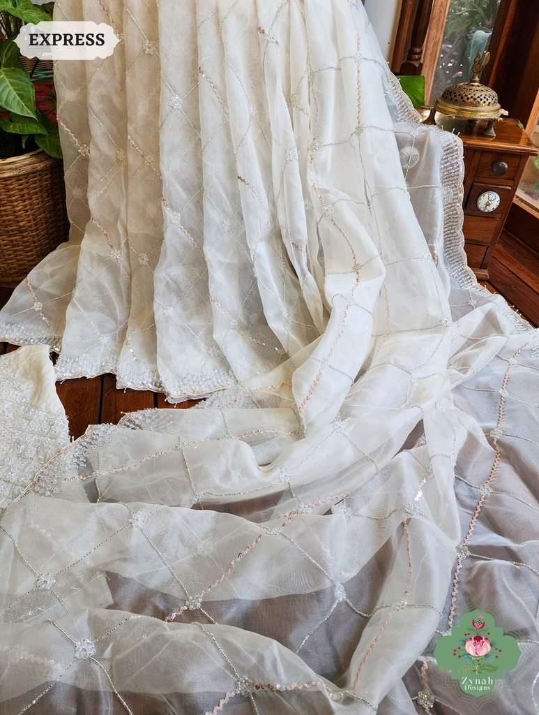 Zynah Off White Organza Silk Saree With Pearls, Cutdana, Sequins & Crystals Hand Embellishments; Custom Stitched/Ready-made Blouse, Fall, Petticoat; SKU: 2711202403
