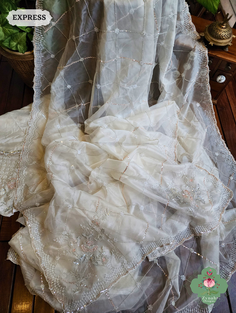 Zynah Off White Organza Silk Saree With Pearls, Cutdana, Sequins & Crystals Hand Embellishments; Custom Stitched/Ready-made Blouse, Fall, Petticoat; SKU: 2711202403