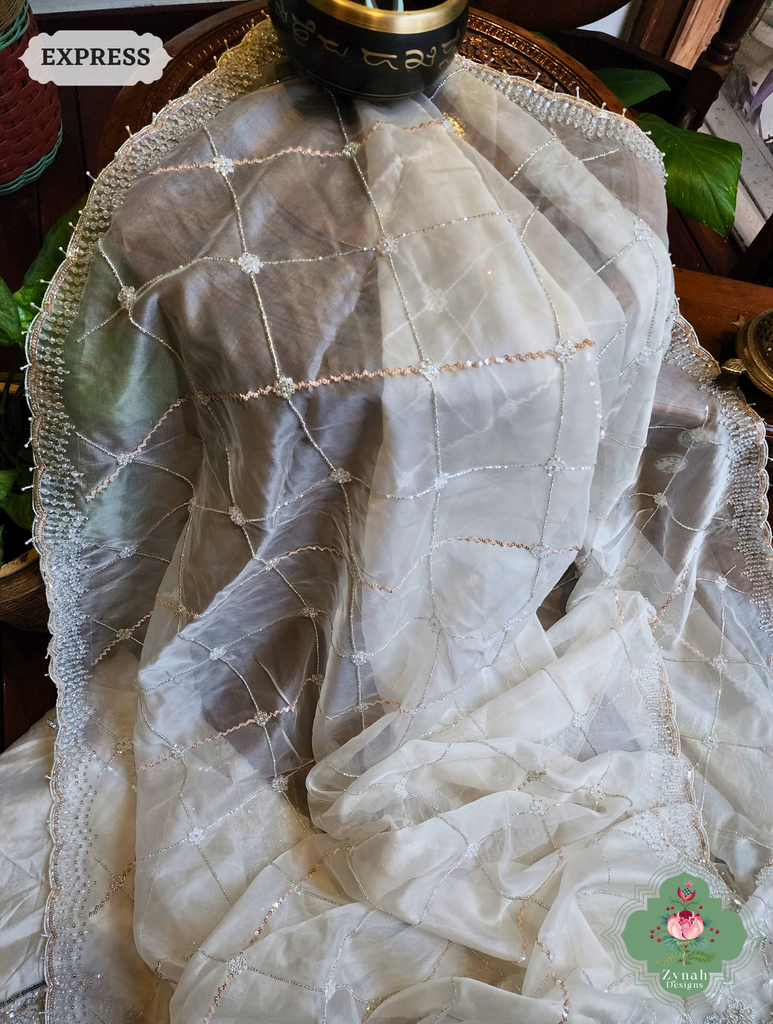Zynah Off White Organza Silk Saree With Pearls, Cutdana, Sequins & Crystals Hand Embellishments; Custom Stitched/Ready-made Blouse, Fall, Petticoat; SKU: 2711202403