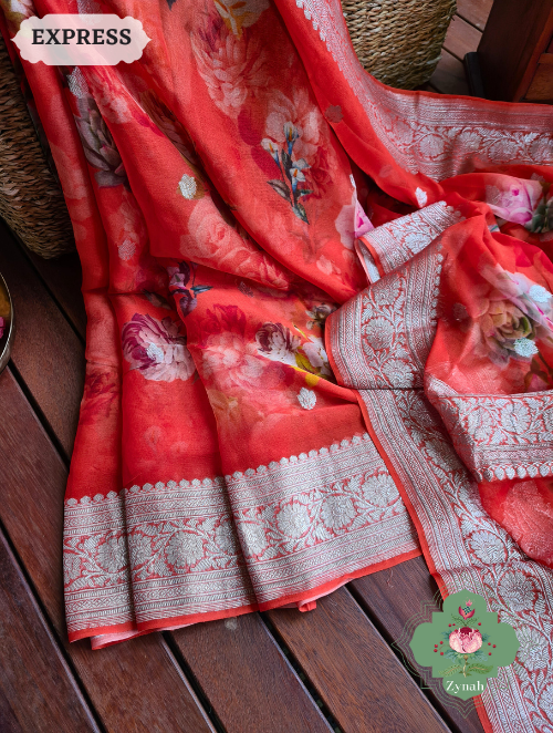 Zynah Orange Pure Khaddi Georgette Floral Banarasi Saree With Silver Zari; Custom Stitched/Ready-made Blouse, Fall, Petticoat; SKU: 2804202301