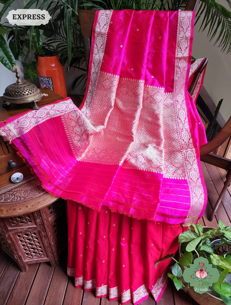 Pink Pure Banarasi Katan Silk Saree: Gold butis, border, and pallu. Regal elegance and timeless charm for special occasions.