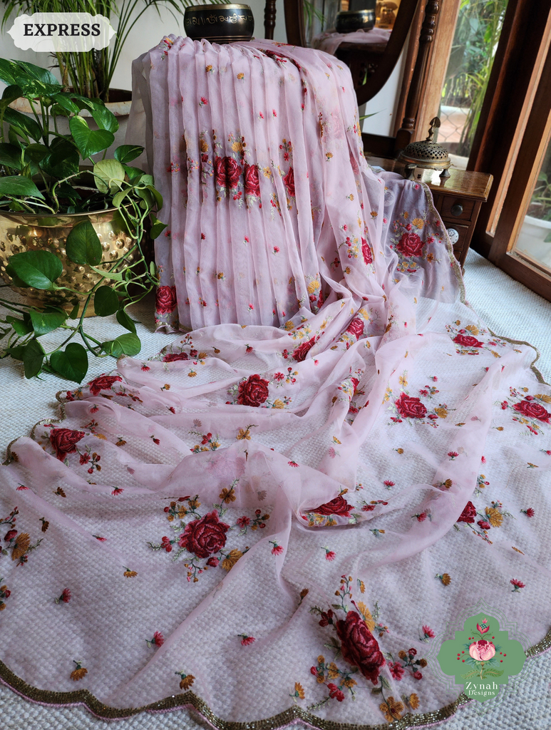 Zynah Pink Organza Silk Saree Featuring Cross-Stitch Embroidered Roses & Scalloped Border Hand Embellished With Cutdana; Custom Stitched/Ready-made Blouse, Fall, Petticoat; SKU: 1112202401