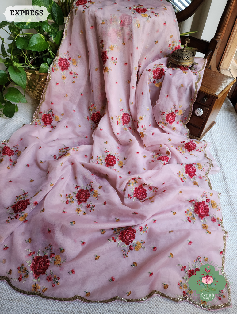 Zynah Pink Organza Silk Saree Featuring Cross-Stitch Embroidered Roses & Scalloped Border Hand Embellished With Cutdana; Custom Stitched/Ready-made Blouse, Fall, Petticoat; SKU: 1112202401