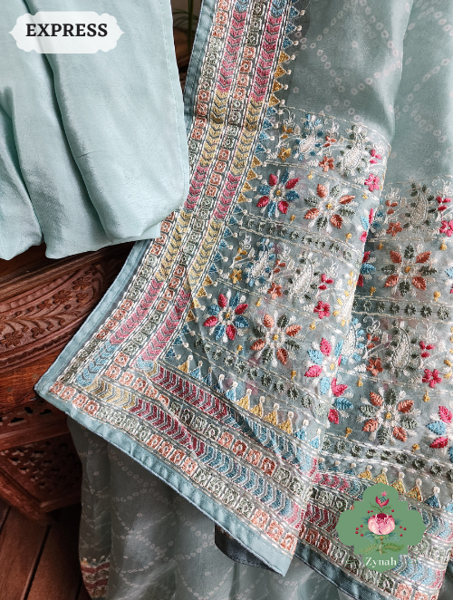 Zynah Powder Blue Organza Silk Saree With Bandhani Prints & Multi-coloured Embroidery On Pallu And Border; Custom Stitched/Ready-made Blouse, Fall, Petticoat; SKU: 1905202301