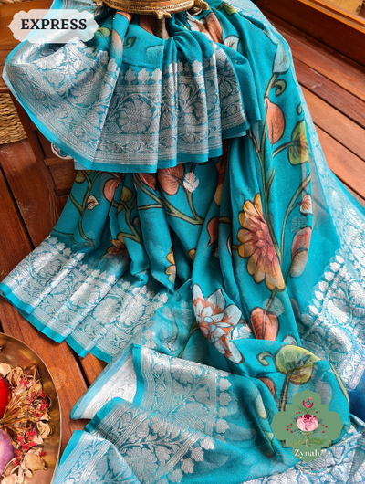 Zynah Turquoise Pure Khaddi Georgette Floral Banarasi Saree With Silver Zari; Custom Stitched/Ready-made Blouse, Fall, Petticoat; SKU: 2804202303
