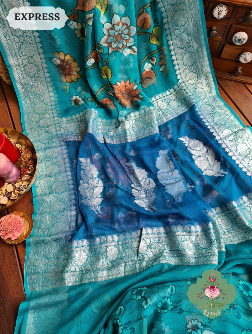 Zynah Turquoise Pure Khaddi Georgette Floral Banarasi Saree With Silver Zari; Custom Stitched/Ready-made Blouse, Fall, Petticoat; SKU: 2804202303