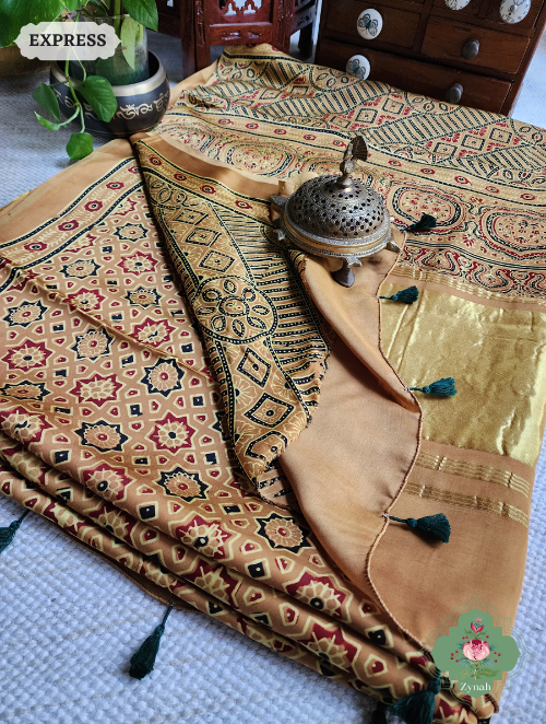 Yellow Ajrakh Modal Silk Saree With Lagdi Patta On Pallu, Crafted Using The Traditional Method Of Hand Block Printing Using 100% Natural Dyes