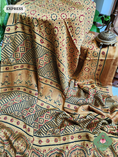 Yellow Ajrakh Modal Silk Saree With Lagdi Patta On Pallu, Crafted Using The Traditional Method Of Hand Block Printing Using 100% Natural Dyes