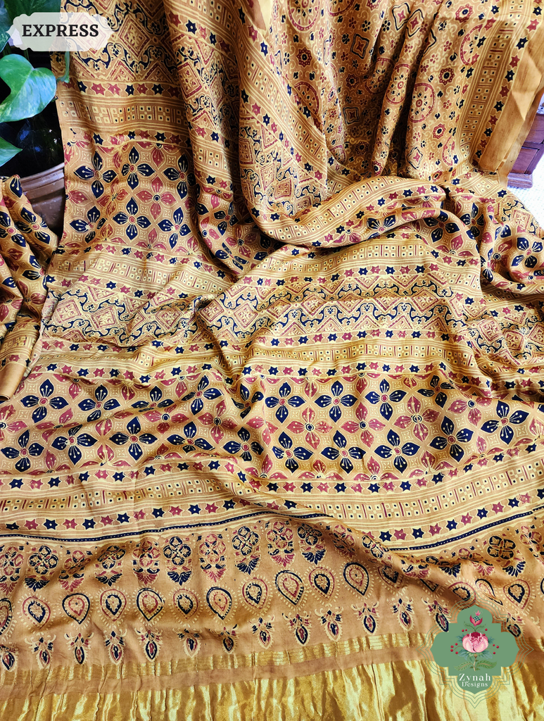 Zynah Yellow Ajrakh Modal Silk Saree With Tissue Pallu Crafted Using The Traditional Method Of Hand Block Printing Using 100% Natural Dyes; Custom Stitched/Ready-made Blouse, Fall, Petticoat; SKU: 1402202502