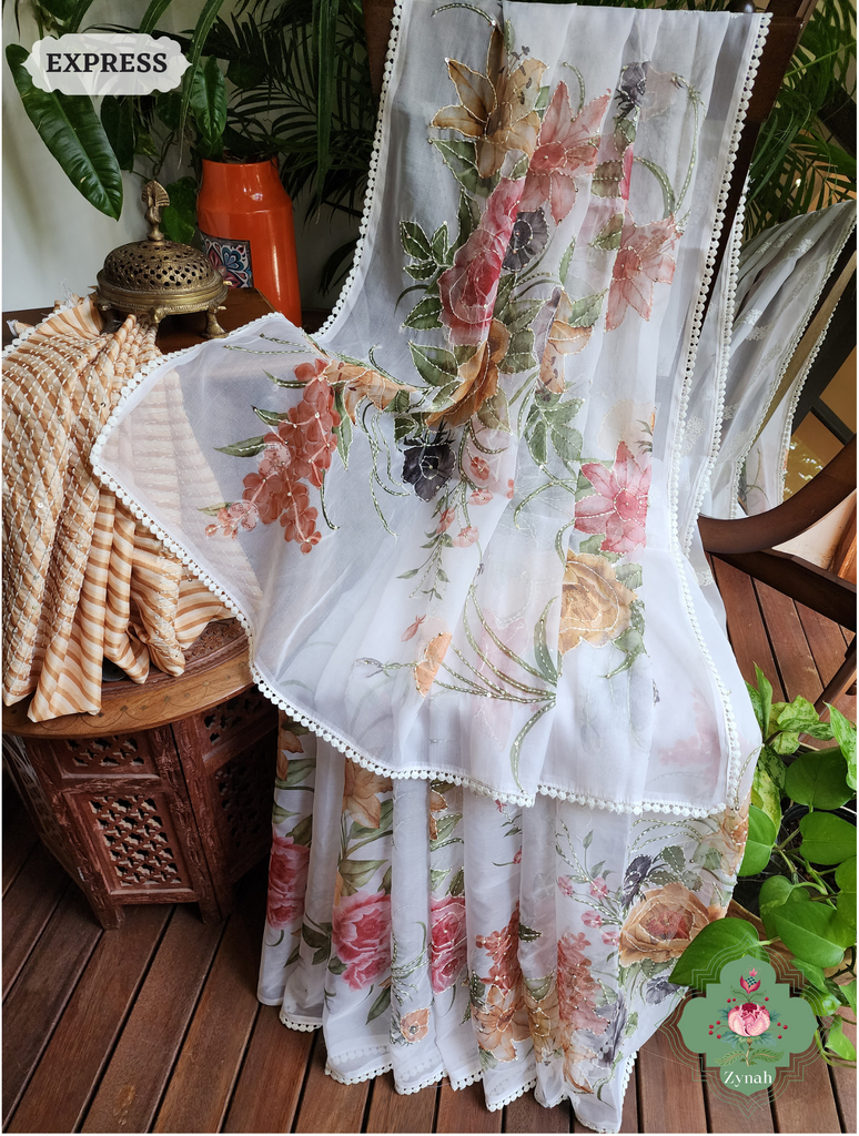 Bold and Beautiful Off White/Yellow Organza Silk Saree with Floral Prints and Kantha Accents. Treat Yourself to Elegance Today!