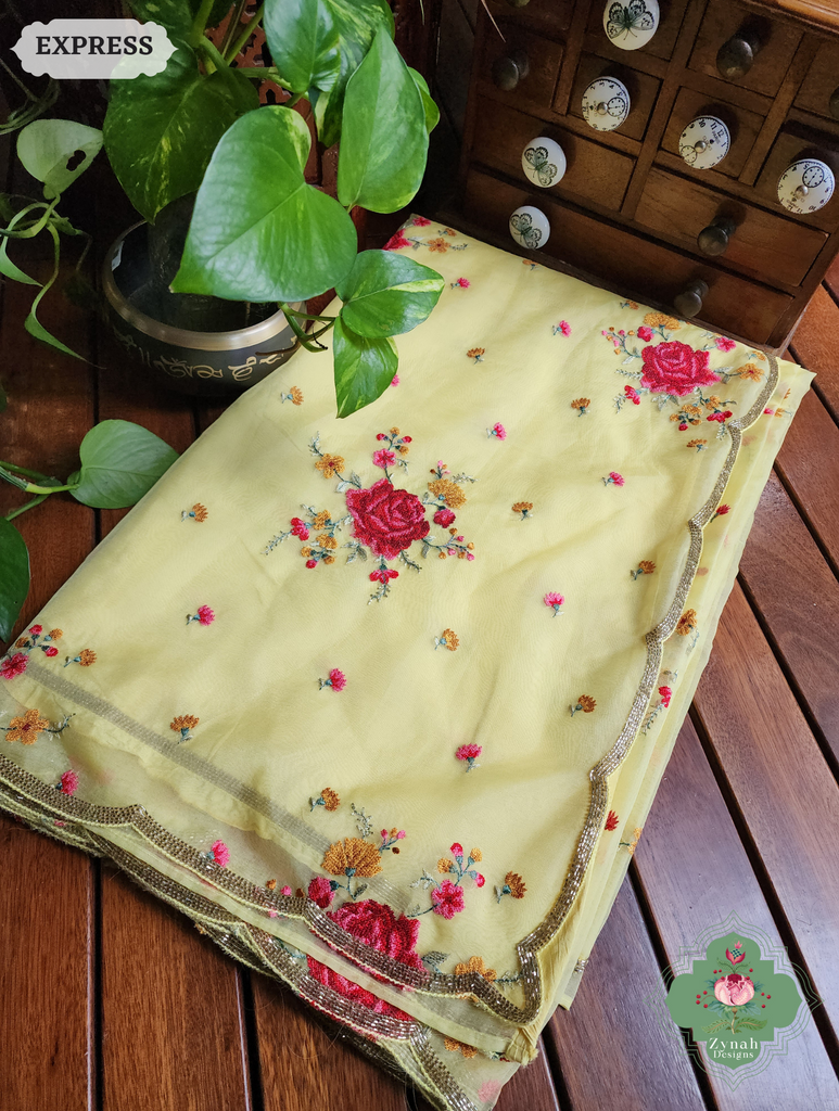 Zynah Yellow Organza Silk Saree Featuring Cross-Stitch Embroidered Roses & Scalloped Border Hand Embellished With Cutdana; Custom Stitched/Ready-made Blouse, Fall, Petticoat; SKU: 1112202401