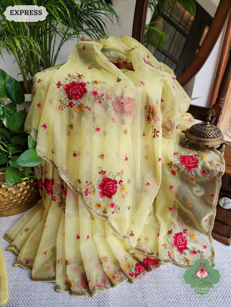 Zynah Yellow Organza Silk Saree Featuring Cross-Stitch Embroidered Roses & Scalloped Border Hand Embellished With Cutdana; Custom Stitched/Ready-made Blouse, Fall, Petticoat; SKU: 1112202401