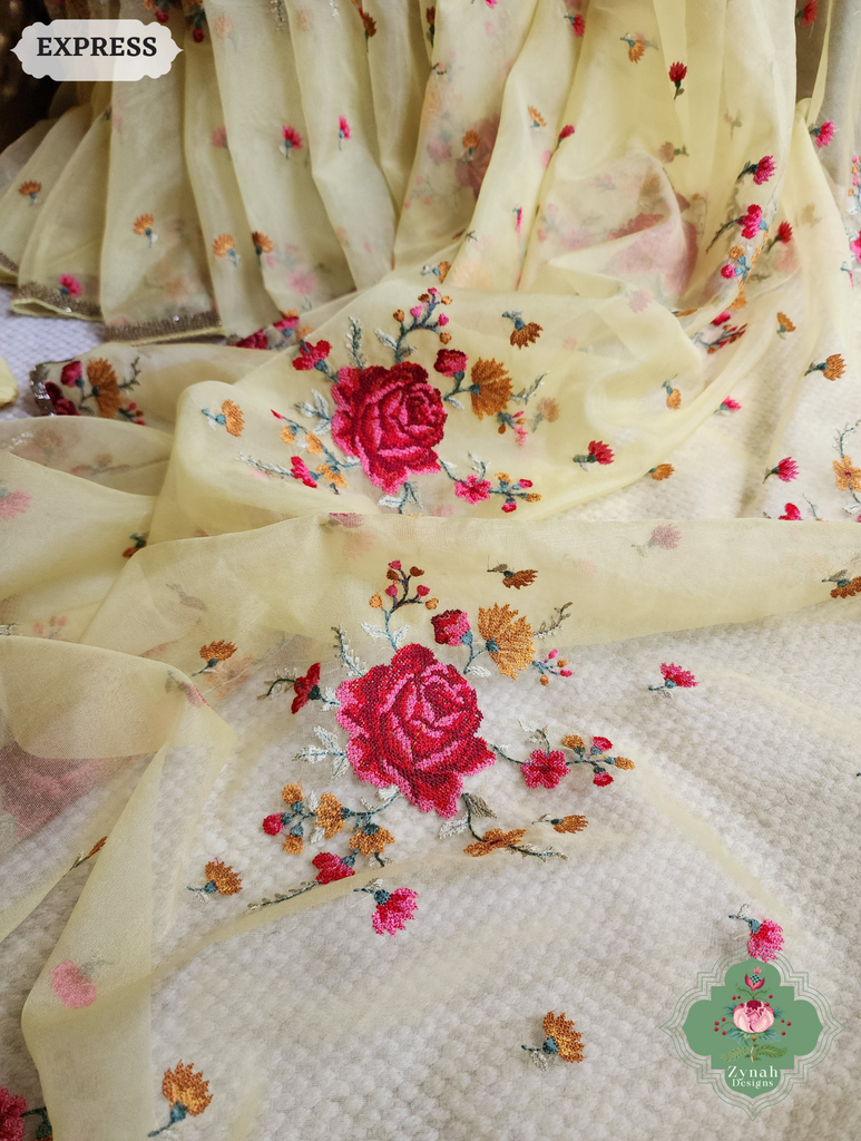 Zynah Yellow Organza Silk Saree Featuring Cross-Stitch Embroidered Roses & Scalloped Border Hand Embellished With Cutdana; Custom Stitched/Ready-made Blouse, Fall, Petticoat; SKU: 1112202401