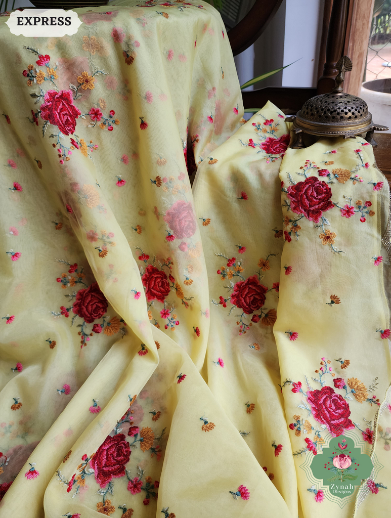 Zynah Yellow Organza Silk Saree Featuring Cross-Stitch Embroidered Roses & Scalloped Border Hand Embellished With Cutdana; Custom Stitched/Ready-made Blouse, Fall, Petticoat; SKU: 1112202401