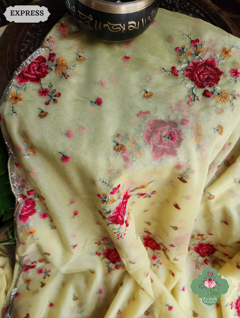 Zynah Yellow Organza Silk Saree Featuring Cross-Stitch Embroidered Roses & Scalloped Border Hand Embellished With Cutdana; Custom Stitched/Ready-made Blouse, Fall, Petticoat; SKU: 1112202401