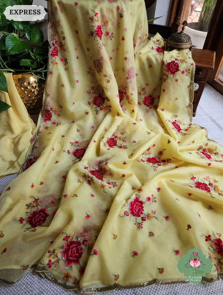 Zynah Yellow Organza Silk Saree Featuring Cross-Stitch Embroidered Roses & Scalloped Border Hand Embellished With Cutdana; Custom Stitched/Ready-made Blouse, Fall, Petticoat; SKU: 1112202401