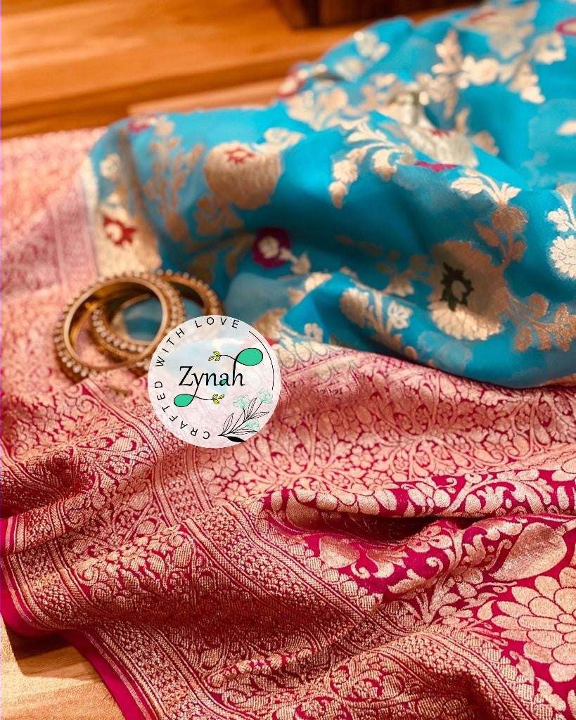Zynah Blue Color Pure Khaddi Georgette Banarasi Saree with Golden Zari & Meenakari Weaved Motifs; Custom Stitched/Ready-made Blouse, Fall, Petticoat; Shipping available USA, Worldwide