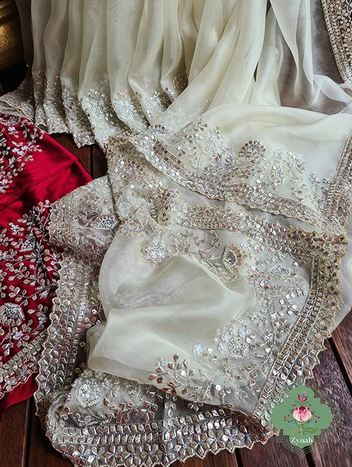 Zynah Cream Colour Pure Organza Silk Saree With Petal Shaped Silver Sequin Work, Pearl Beads & Cutdana Handwork; Custom Stitched/Ready-made Blouse, Fall, Petticoat; SKU: 1001202302