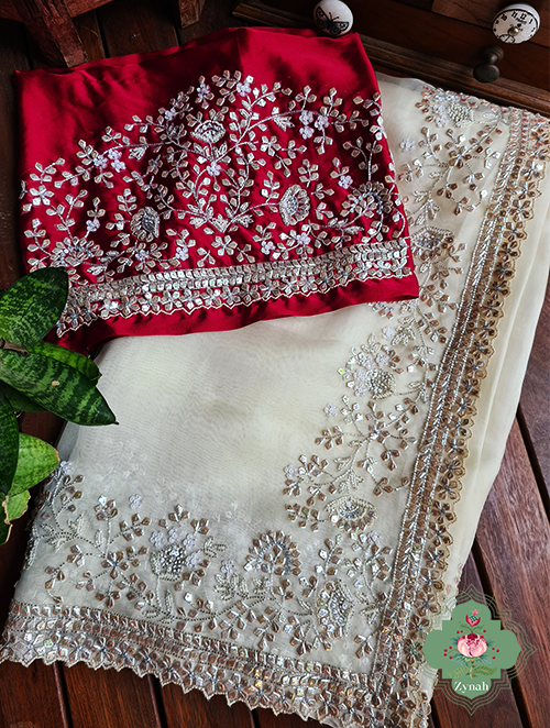 Zynah Cream Colour Pure Organza Silk Saree With Petal Shaped Silver Sequin Work, Pearl Beads & Cutdana Handwork; Custom Stitched/Ready-made Blouse, Fall, Petticoat; SKU: 1001202302
