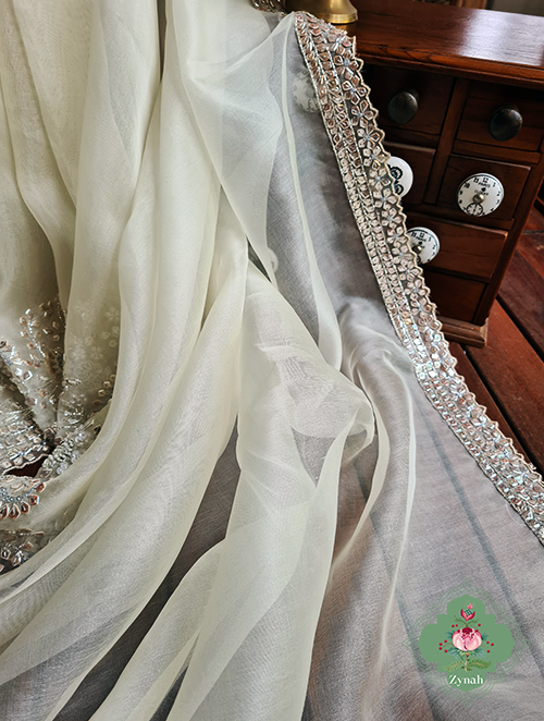 Zynah Cream Colour Pure Organza Silk Saree With Petal Shaped Silver Sequin Work, Pearl Beads & Cutdana Handwork; Custom Stitched/Ready-made Blouse, Fall, Petticoat; SKU: 1001202302