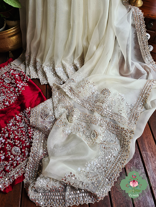 Zynah Cream Colour Pure Organza Silk Saree With Petal Shaped Silver Sequin Work, Pearl Beads & Cutdana Handwork; Custom Stitched/Ready-made Blouse, Fall, Petticoat; SKU: 1001202302