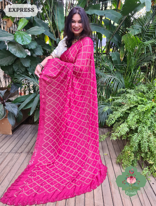 Zynah Hot Pink Wrinkle Crepe Silk Saree with Bandhani Inspired Prints & Mirror Work Scalloped Borders; Custom Stitched/Ready-made Blouse, Fall, Petticoat; SKU: 0202202302 Zynah Hot Pink Wrinkle Crepe Silk Saree with Bandhani Inspired Prints & Mirror Work Scalloped Borders; Custom Stitched/Ready-made Blouse, Fall, Petticoat; SKU: 0202202302
