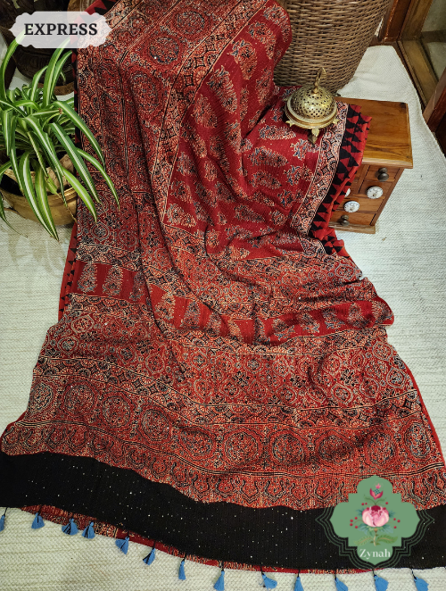 Zynah Madder Red Pure Georgette Silk Ajrakh Saree With Sequin Work; Custom Stitched/Ready-made Blouse, Fall, Petticoat; SKU: 2102202304 Zynah Madder Red Pure Georgette Silk Ajrakh Saree With Sequin Work; Custom Stitched/Ready-made Blouse, Fall, Petticoat; SKU: 2102202304