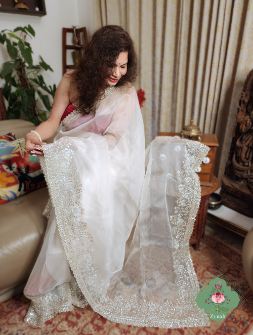 Zynah Cream Colour Pure Organza Silk Saree With Petal Shaped Silver Sequin Work, Pearl Beads & Cutdana Handwork; Custom Stitched/Ready-made Blouse, Fall, Petticoat; SKU: 1001202302