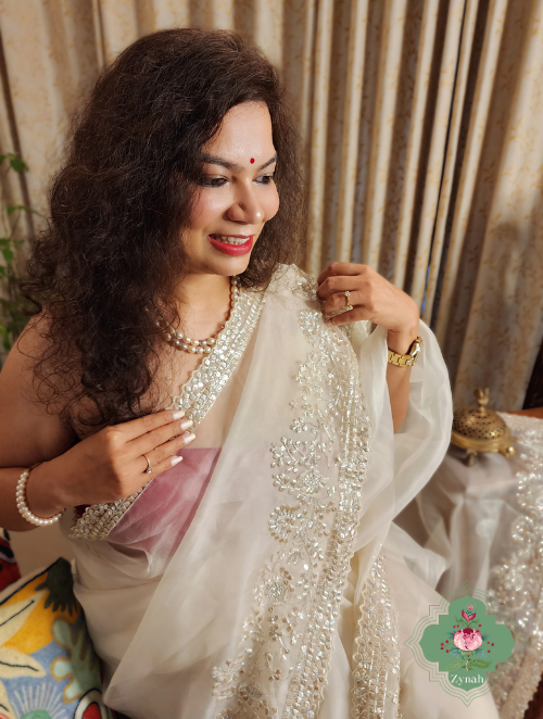 Zynah Cream Colour Pure Organza Silk Saree With Petal Shaped Silver Sequin Work, Pearl Beads & Cutdana Handwork; Custom Stitched/Ready-made Blouse, Fall, Petticoat; SKU: 1001202302