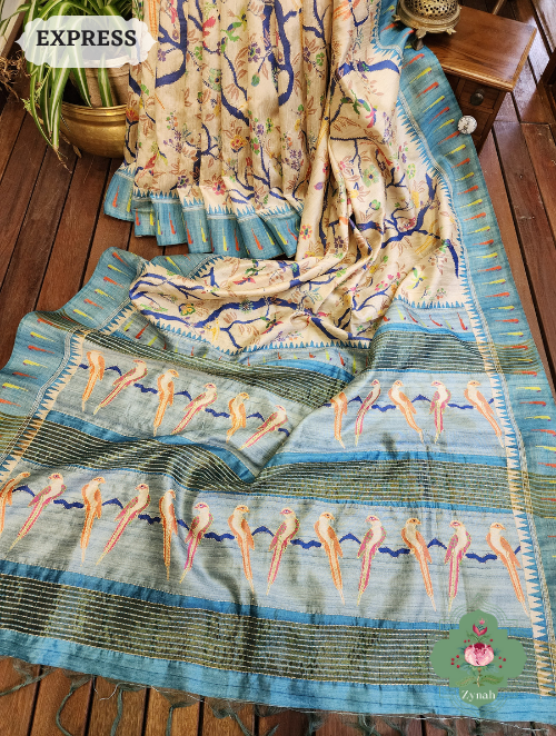 Beige/Sky Blue Jute Linen Saree with Kantha Work, a perfect blend of elegance and comfort. Handcrafted with intricate embroidery.