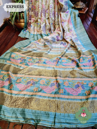 Beige/Turquoise Jute Linen Saree with Kantha Work, a stunning saree that exudes elegance and charm. Lightweight and comfortable.