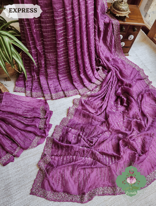 Exquisite Satin Organza Silk Saree with cut bead & pearl handwork- a timeless, elegant piece made to dazzle in any occasion.