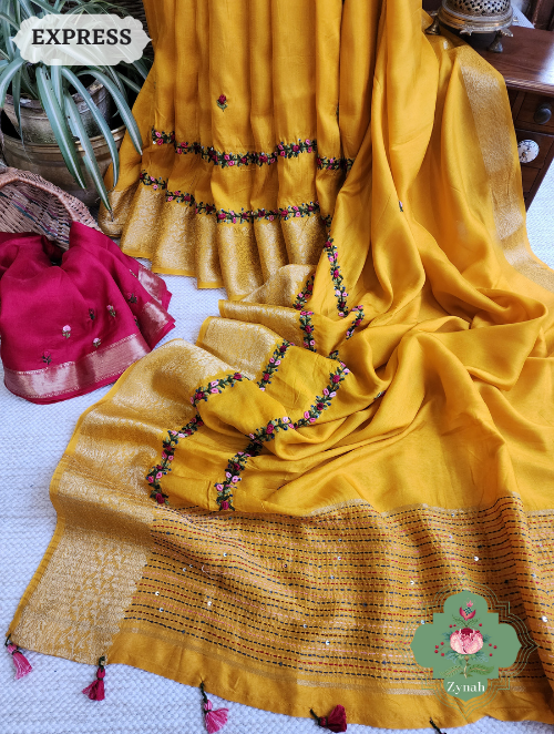 Yellow Munga Silk Saree with Zari borders & Frenchknot/Kantha embroidery. Hand-embroidered vine design throughout length