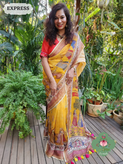 Organic linen saree in yellow, Pichwai print & zari border. Blend of tradition & contemporary. Ideal for any occasion.