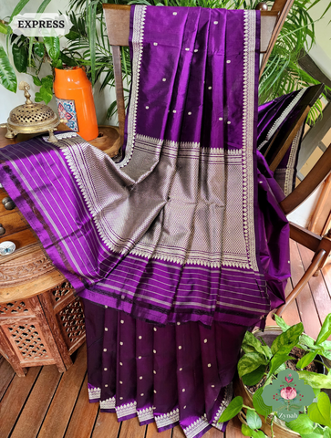 Aubergine Banarasi Silk Saree: Silver butis, border, pallu. Timeless elegance in pure silk. Perfect for grand occasions.