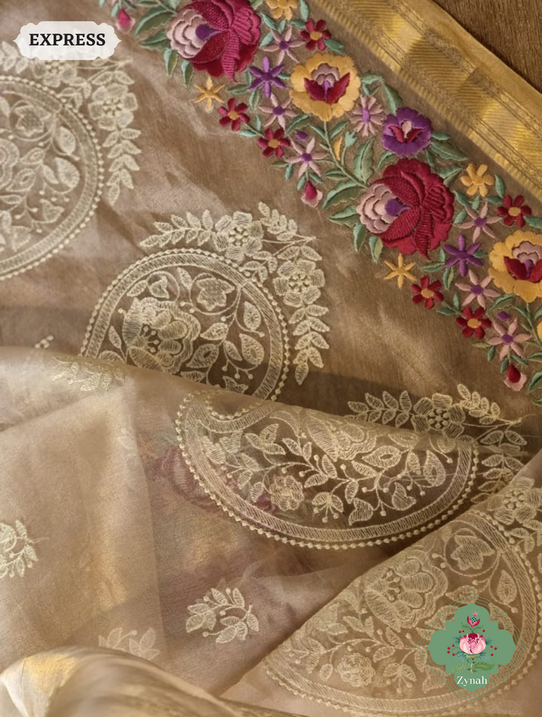 Off White Pure Tissue Silk Saree With Parsi Work & Chikankari Inspired Embroidery On The Border