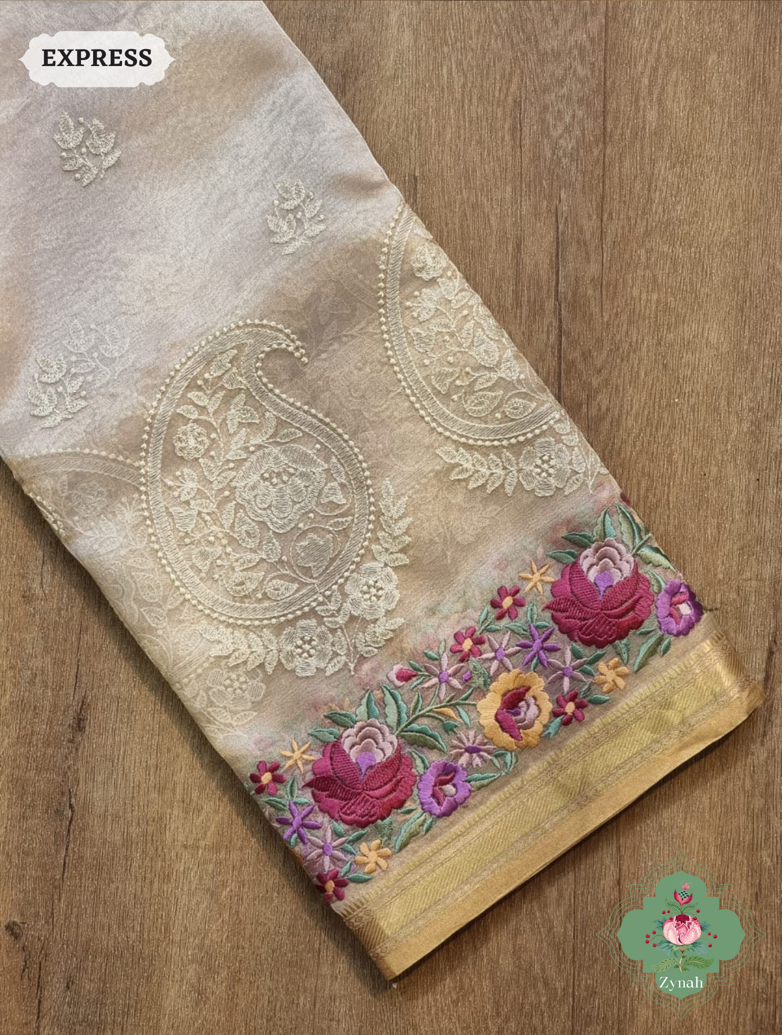 Off White Pure Tissue Silk Saree With Parsi Work & Chikankari Inspired Embroidery On The Border