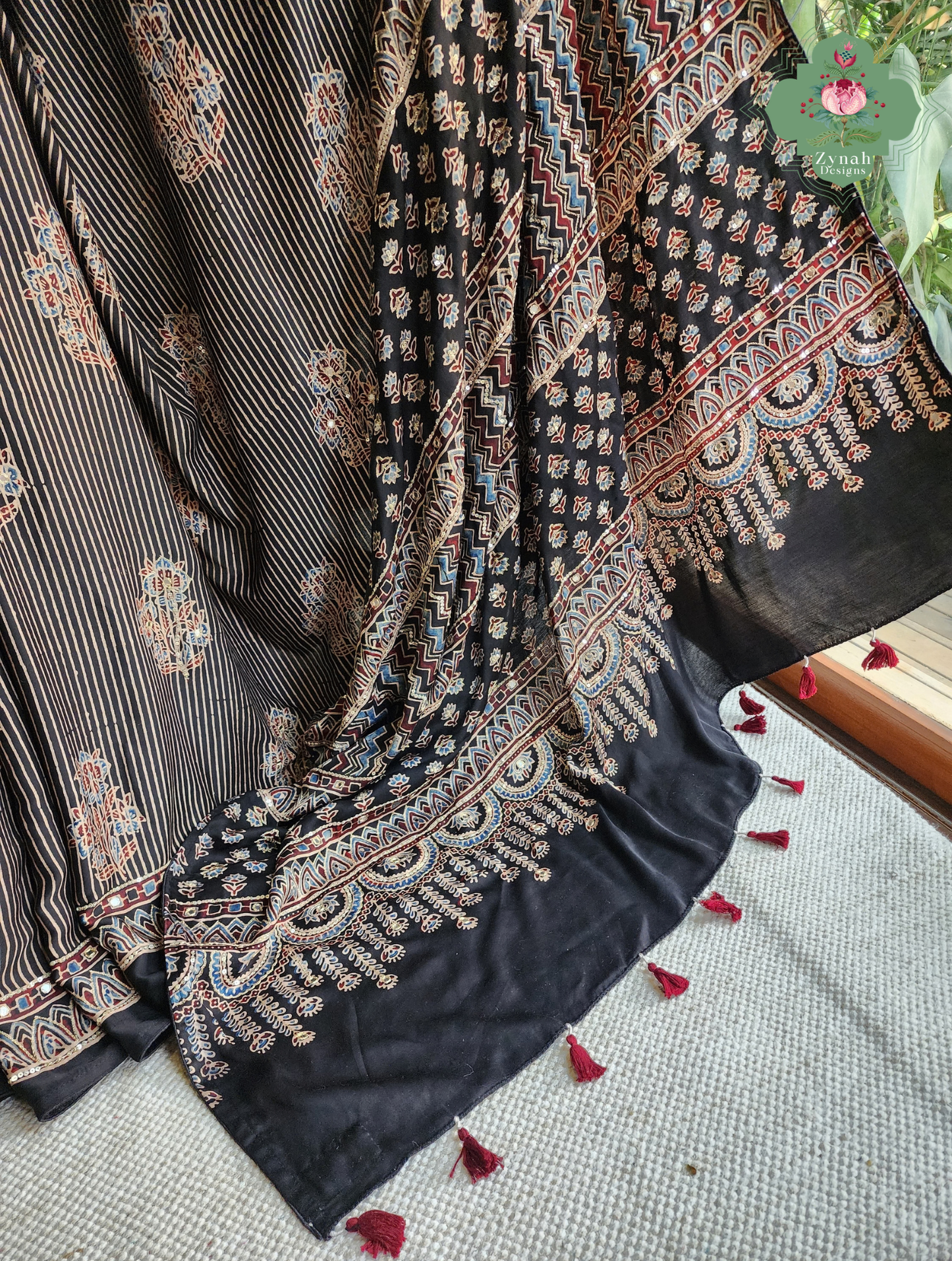 Zynah Sunehri Viraasat – Beige & Black Ajrakh Modal Silk Saree with Hand Embellishments