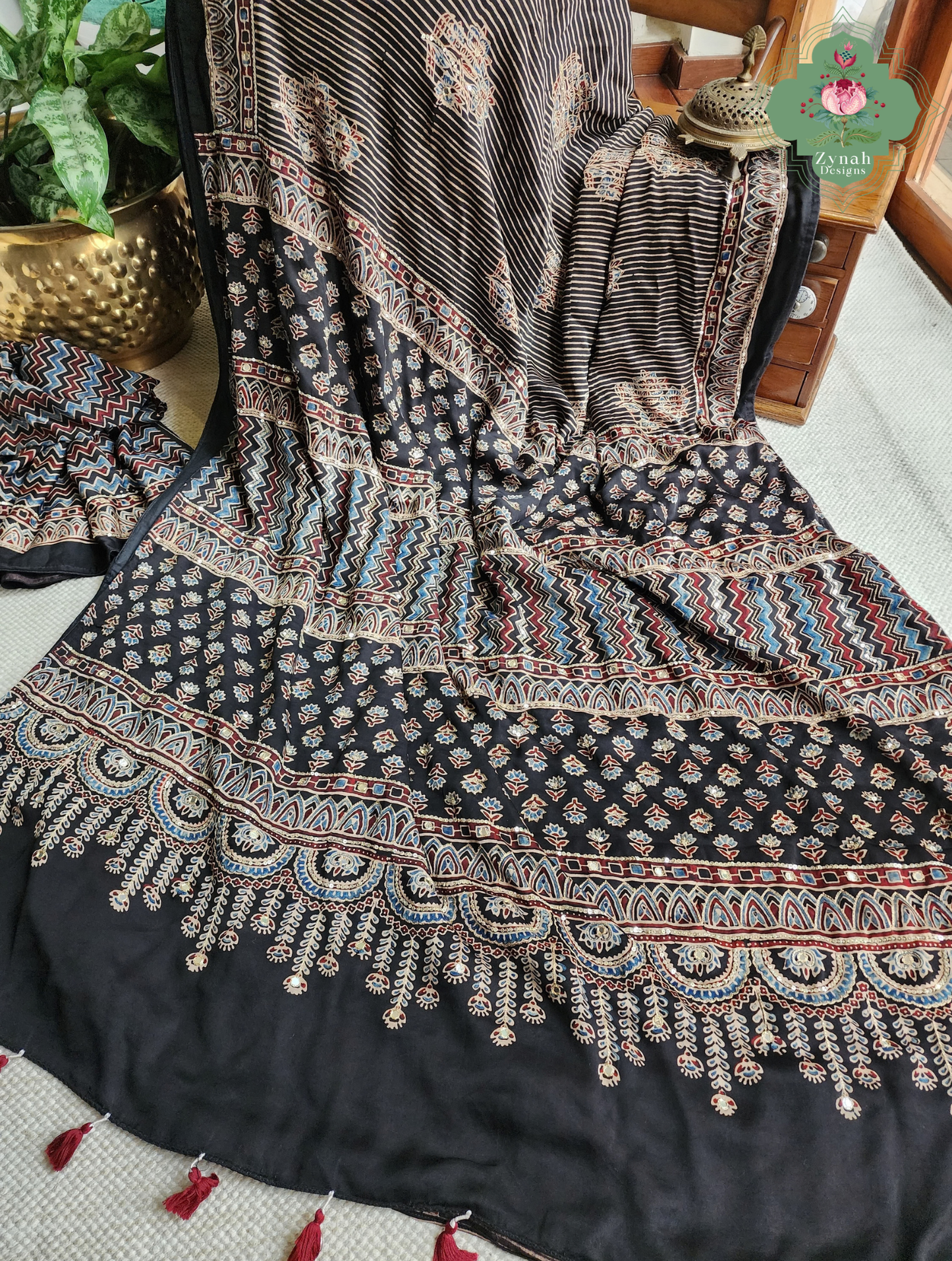 Zynah Sunehri Viraasat – Beige & Black Ajrakh Modal Silk Saree with Hand Embellishments