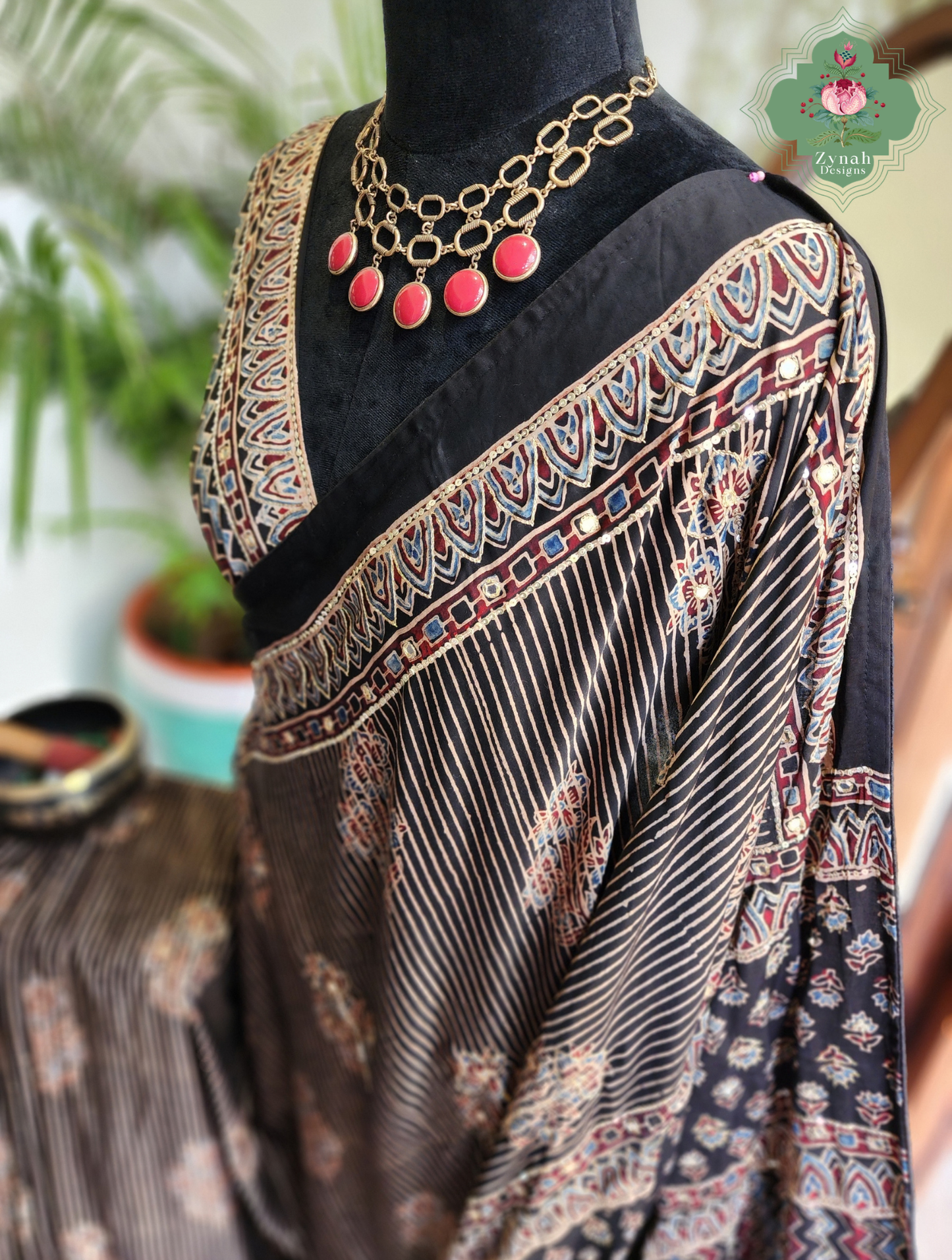 Zynah Sunehri Viraasat – Beige & Black Ajrakh Modal Silk Saree with Hand Embellishments